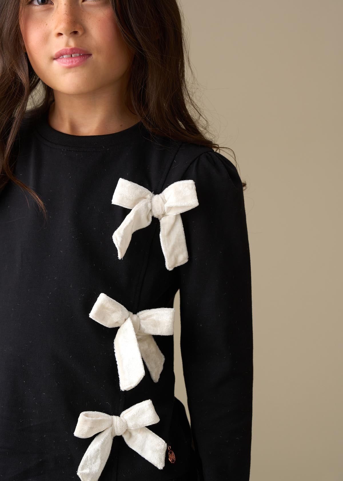 online girl asymmetric bow ls top black