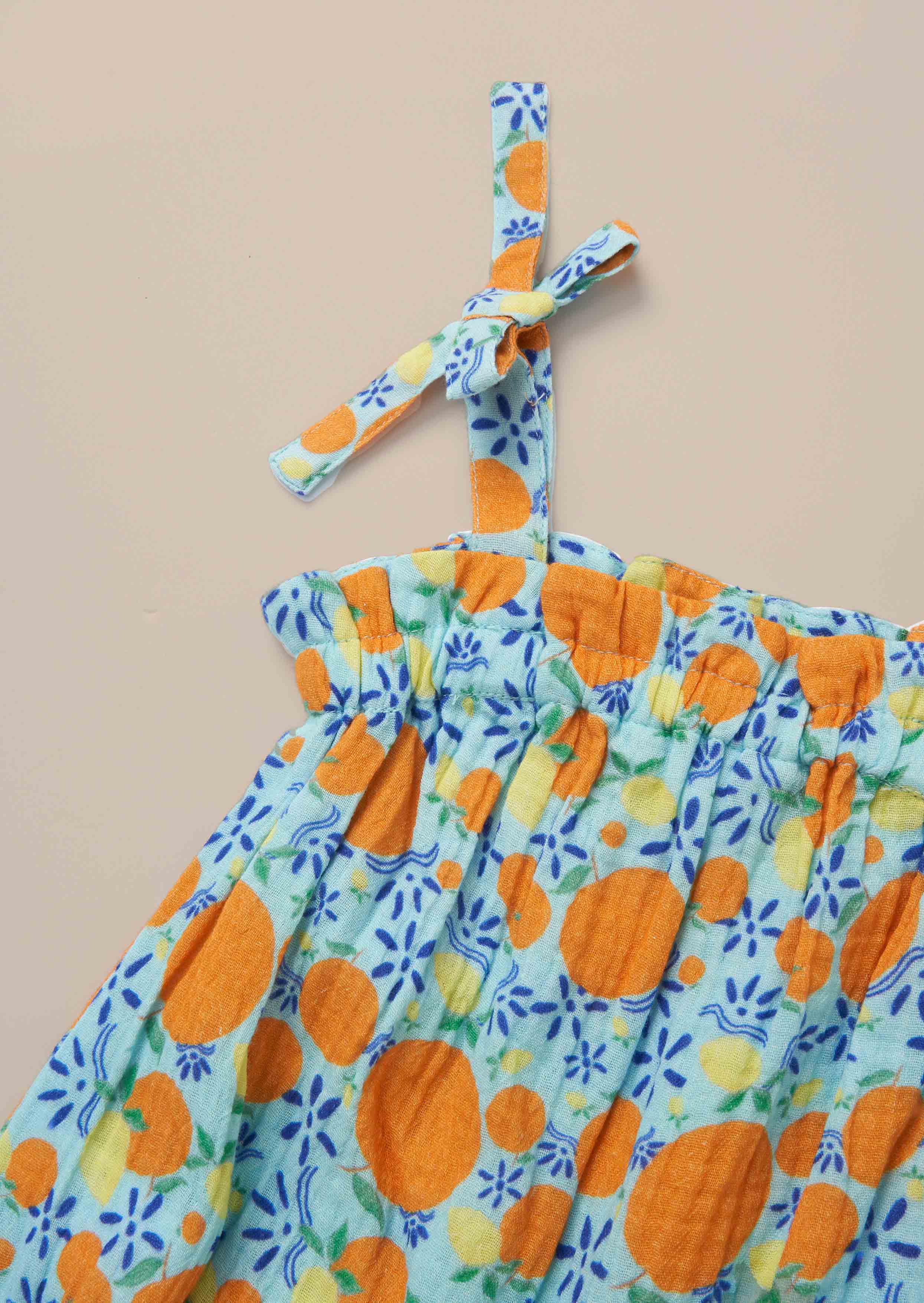 Sleeveless Blue Double Cloth Fruit Print Romper