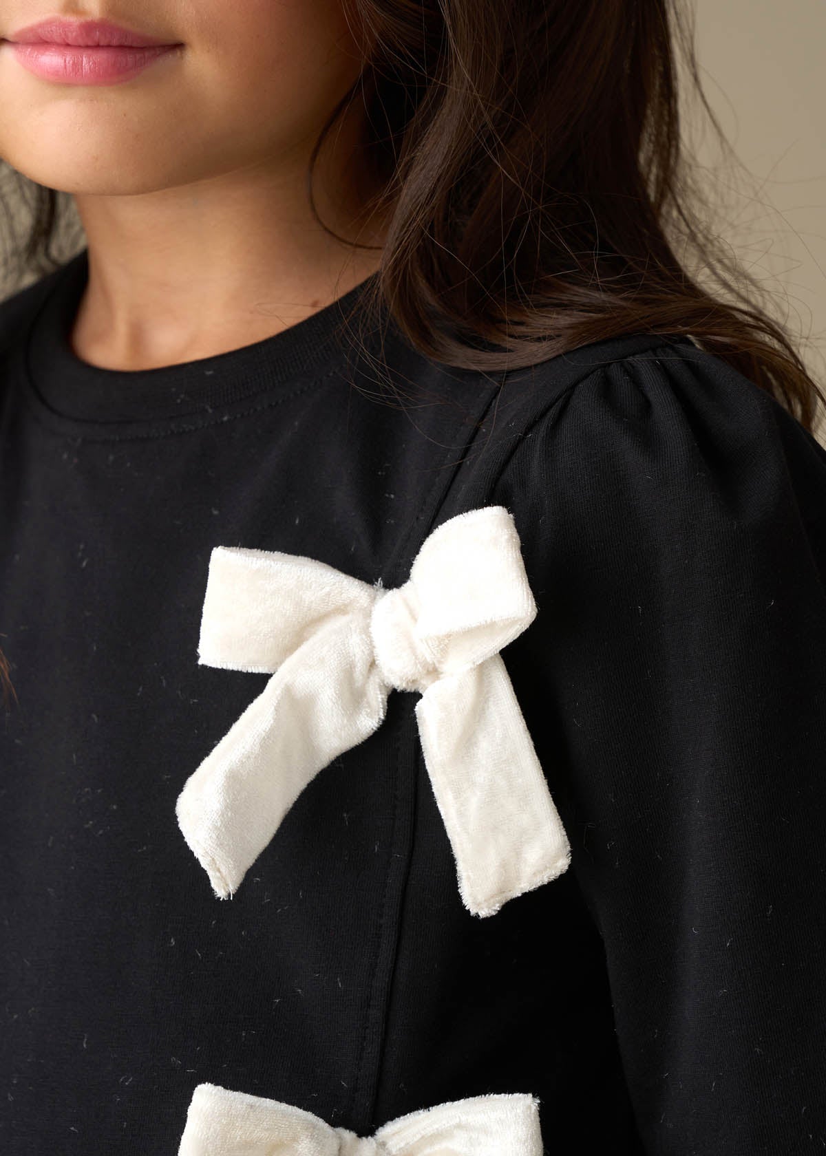 cotton girl asymmetric bow ls top black