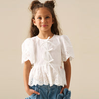 Ria Broderie Tie Front Peplum Top