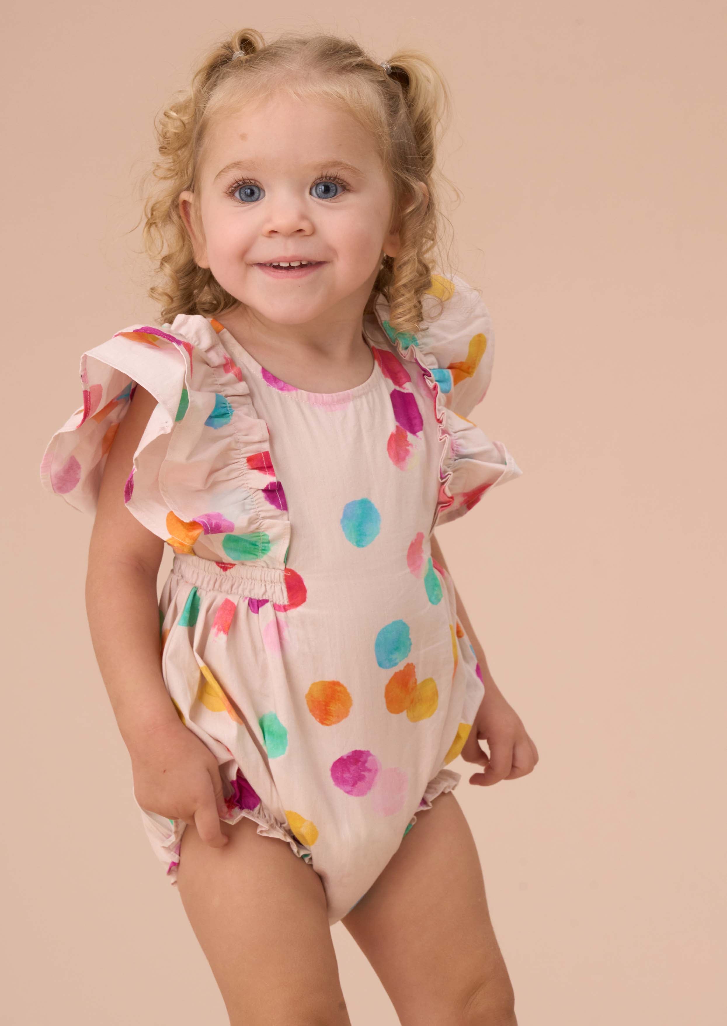 cotton baby girl multi rainbow spot romper